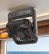 Black portable fan mounted on ceiling or wall indigo fixture. Device features front-facing rotary fan blades with black casing and control panel on top. Indoor residential setting with warm lighting and ocean view window.