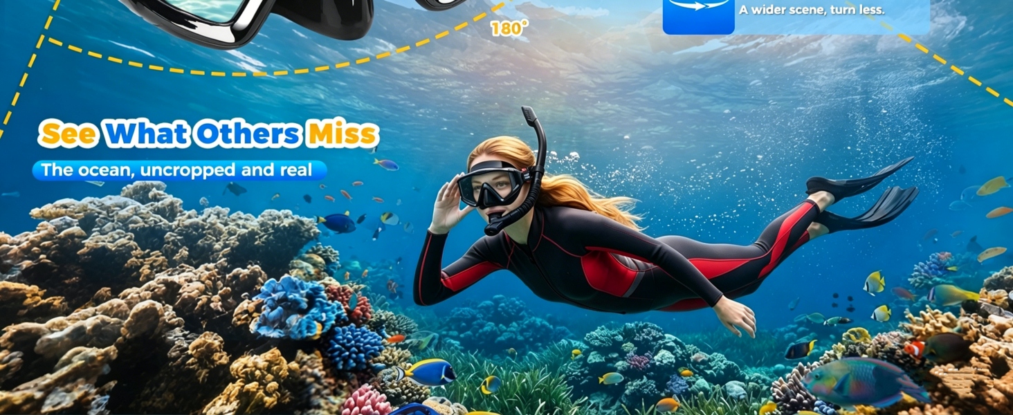 man snorkeling over coral reef looking back at sea turtle through 3-window mask wide uncropped view