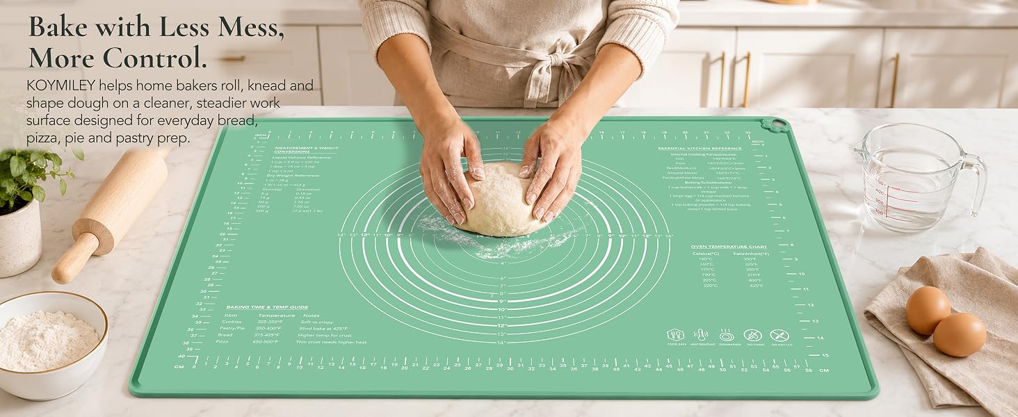 KOYMILEY green platinum silicone pastry mat used for rolling dough on a clean kitchen counter.