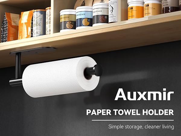 Black under cabinet paper towel holder mounted below kitchen shelf with roll installed