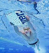 athlete using arena swim kickboard in the pool wearign arena swim goggles under water