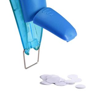 closeup image of how easy it is do dispose of the paper punches after using paper punch for kids