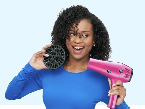 Woman holding dryer and diffuser