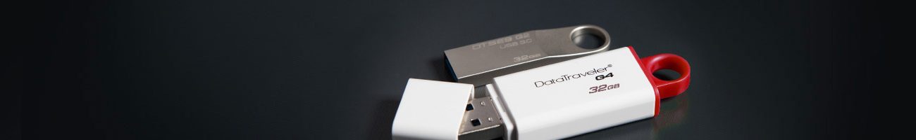 DataTraveler® Generation 4 32GB USB drive next to another kingston thumb drive