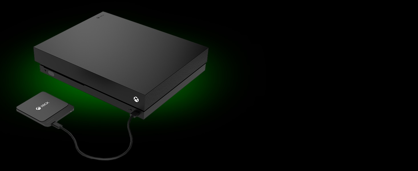 Seagate Game Drive for Xbox 500GB USB 3.0 SSD Plugged into a Black Xbox via USB Cable