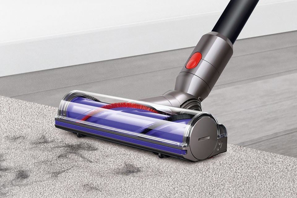 Dyson V7 Absolute with direct-drive cleaner head cleaning hairs