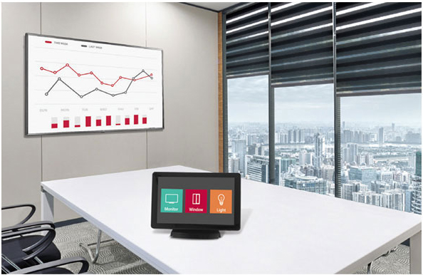 LG commercial display in an office's meeting room wall