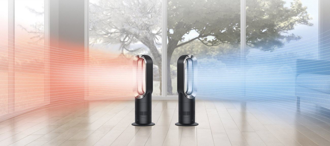 one Dyson AM09 Fan Heater delivering hot air to the left and one Dyson AM09 Fan Heater delivering cool air to the right