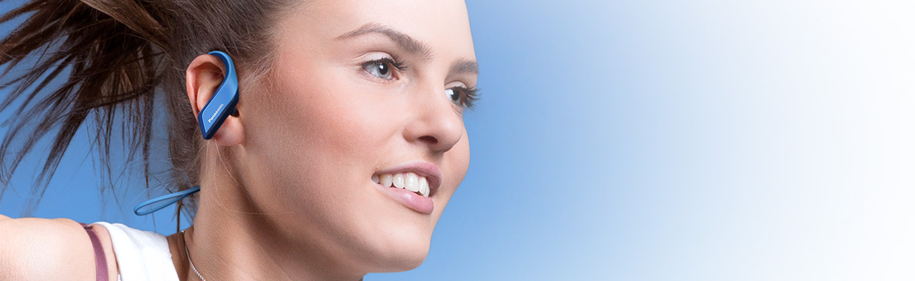 A girl wearing WINGS Ultra-Light Wireless Bluetooth Sport Earphones