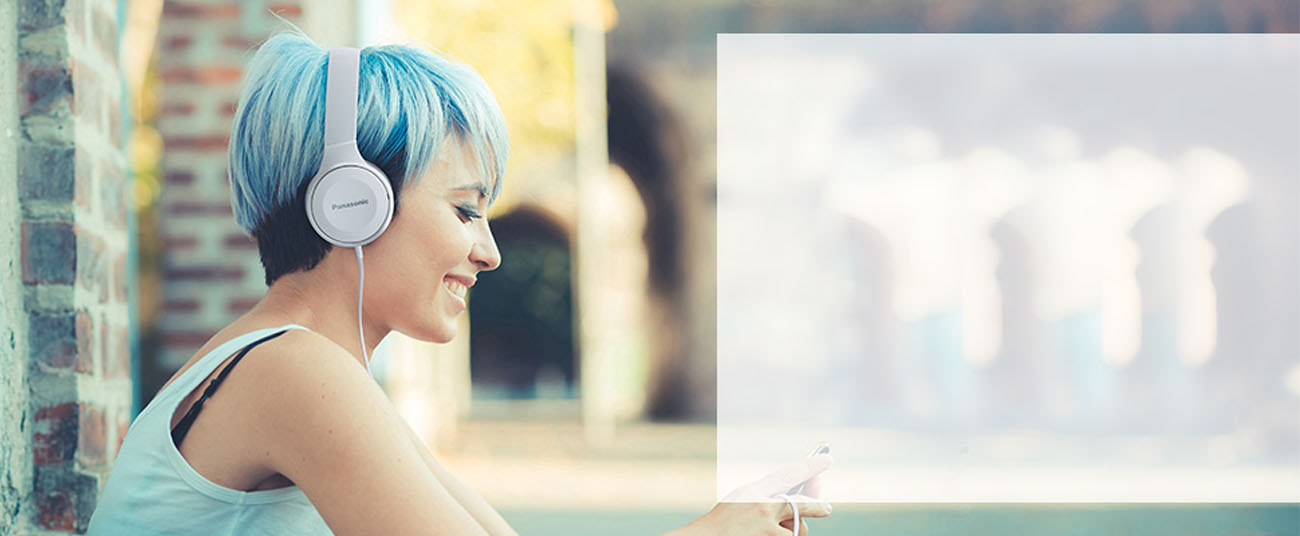A girl wearing Panasonic Lightweight On-Ear Headphones
