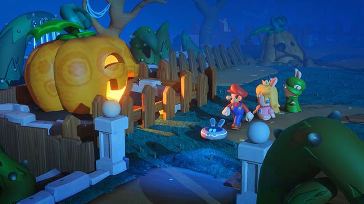 screenshot for Mario and Rabbids Kingdom Battle showing a Halloween, pumpkin-themed level