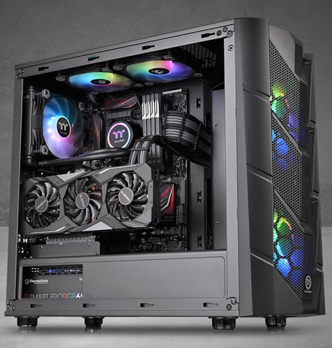 Thermaltake Commander C36 facing to the right fully loaded with components and RGB-lit fans