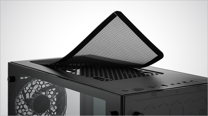 The dust filter folding away from the top of the Rosewill PRISM T500 case