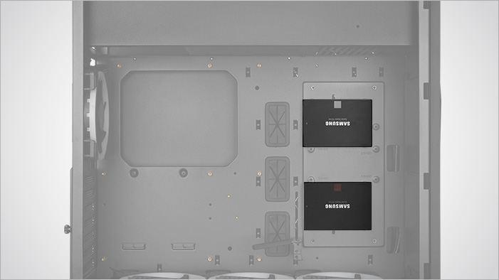 Transparent Rosewill ATX Mid Tower Gaming PC Computer Case Facing to the Right with Its Side Panel Removed and Focus on the SSD Bays