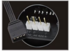 Closeup shot of the 4-pin cable and the 4-pin male connectors on a motherboard