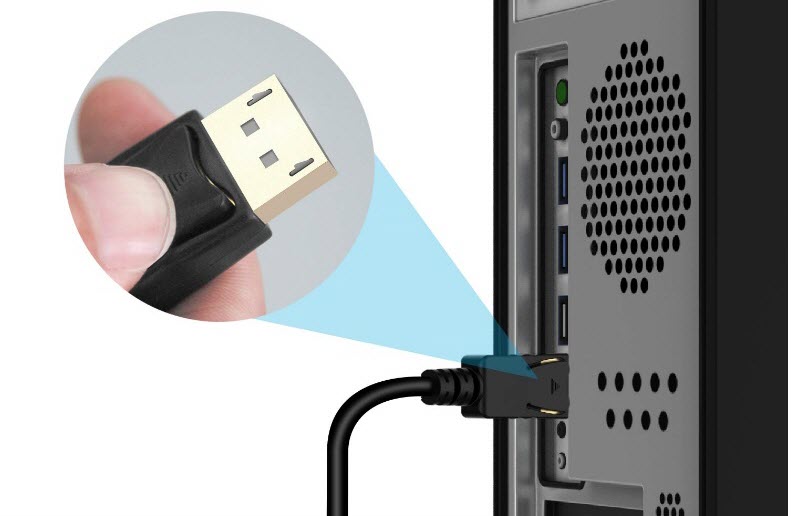 a hand is pluging the Kaybles DP-DP cable into the back panel of a PC