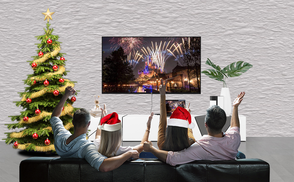 two men and two women sitting on the couch watching TV