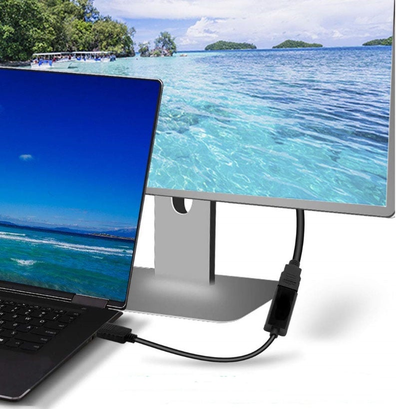 a laptop connected to a monitor using Nippon Labs DisplayPort to HDMI Adapter