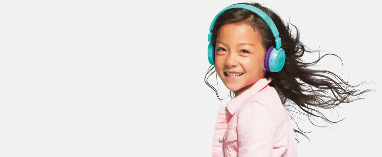 A girl wears JBL JR 300BT Kids On-Ear Wireless Headphones