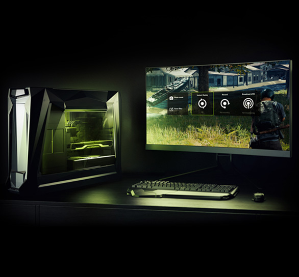 A Gaming Desktop next to a monitor, keyboard and mouse showing a game screenshot of a FPS battle royale looting stage