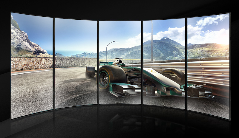 6 lined up horizontal panels showing a collective image of a racer car in a mountain-range race track