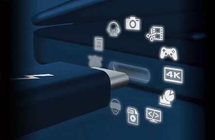 A graphic showing a usb-c being plugged in and icons for all its capabilities like gaming and multimedia