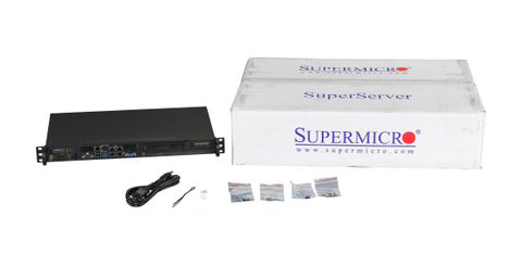 Supermicro SYS-5018A-FTN4 Next to Its Product Box and Package Contents