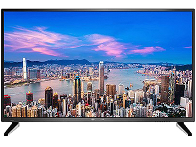 The BOLVA 55BL00H7 TV facing forward with an image of a large city on the sides of a body of water, pink clouds in the sky and a dark blue sky