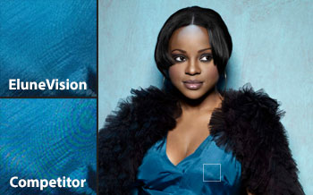 a black woman wearing a black and blue dress