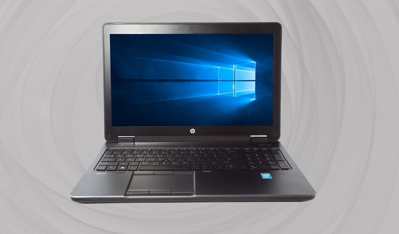 An opened laptop shows a display and a keyboard.
