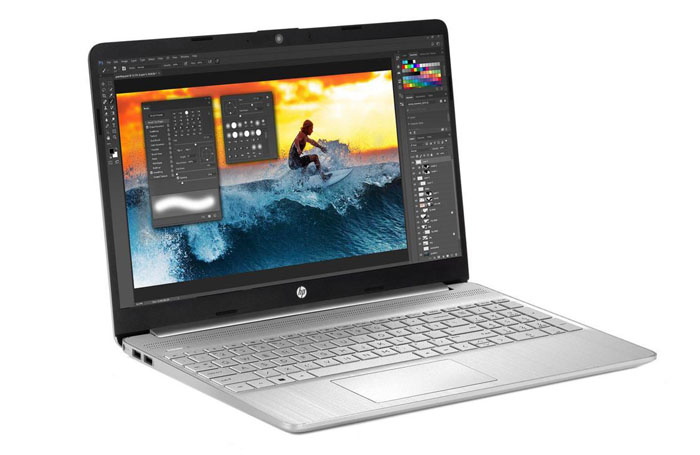HP 15 Notebook angled to right showing the interface of PhotoShoop