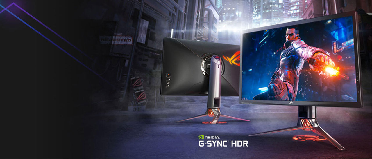  Front and rear of an Asus gaming monitor. The background is a night street 