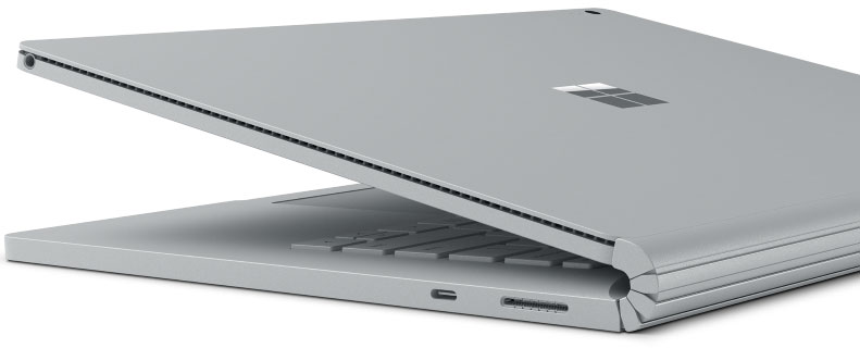  Side angle view of a half opened Surface Book 2, showing ports on the right side  