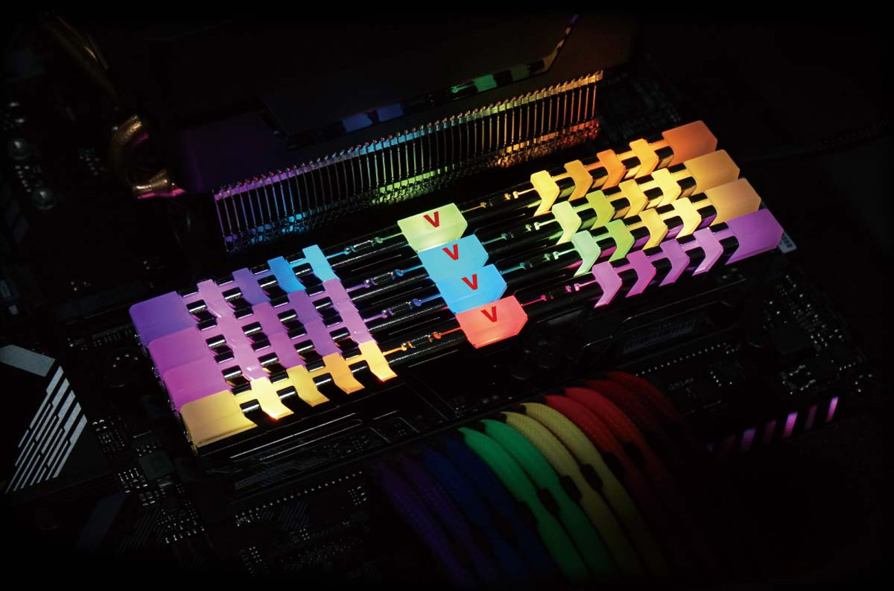 4 v-color memory sticks installed into a motherboard and showing their various RGB lighting