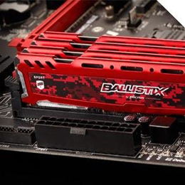    Four Ballistix Sport LT memory modules with red heatspreader on a motherboard