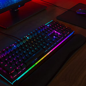 Birdseye view of the Rosewill NEON K75 V2 keboard lit up in rainbow