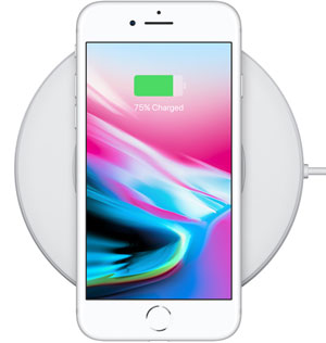  Top view of iPhone 8 placed on a wireless charging mat  