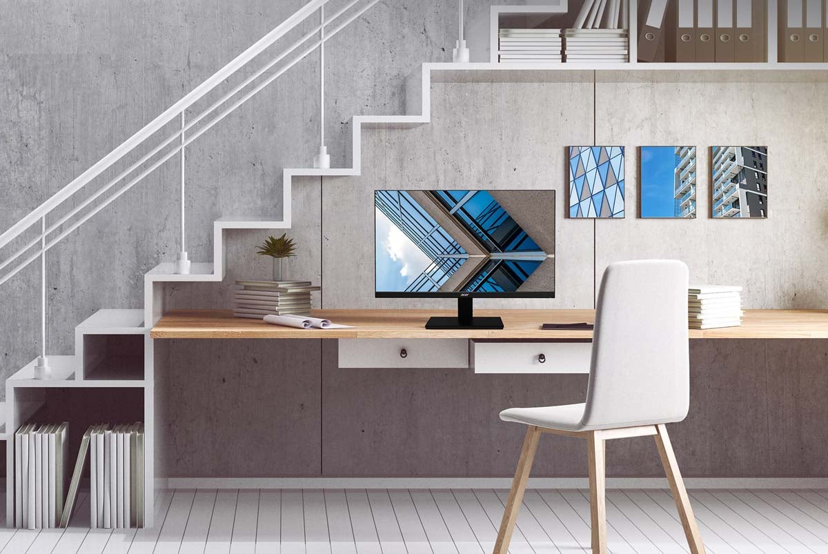 Acer V277U Monitor on a Desk Under a Modern Stairway at Home