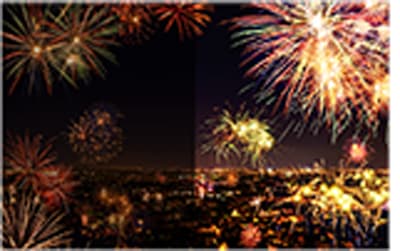 fireworks going off in the night sky