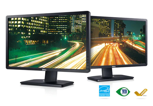 two monitors with a nightscape as screen