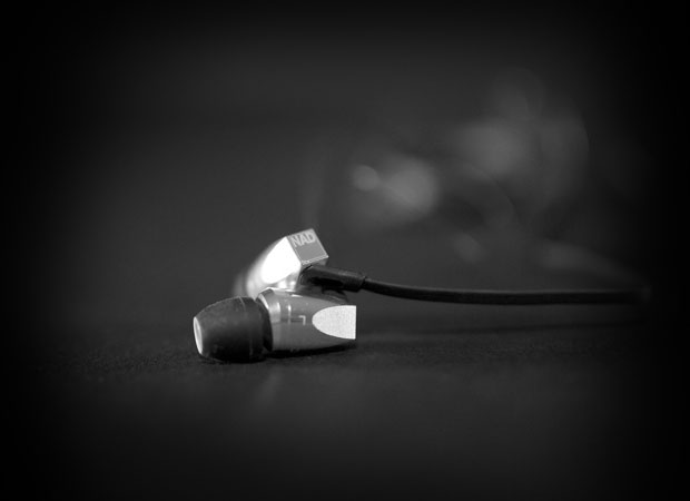 HP20 In-Ear Headphones Lying Down on a Surface