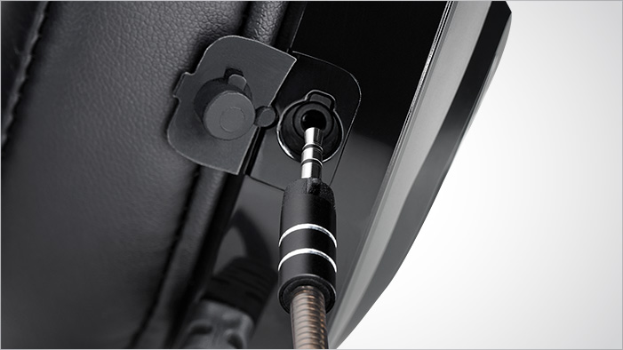 Closeup of the 8mm detachable mic jack and port on the left earcup of the Rosewill NEBULA GX51 headset