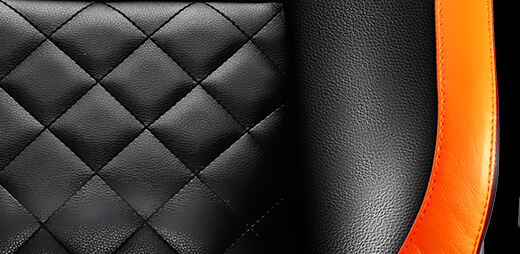 Closeup of the Couar Armor Titan gaming chair's leather back and sides