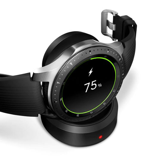 A watch is placed on a charger shower a power level of 75%