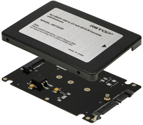  The internal PCB, with SATA connector facing to the five o’clock. Floating above it is the cover  
