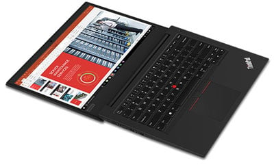 Lenovo ThinkPad E495 laid flat showing a PowerPoint interface