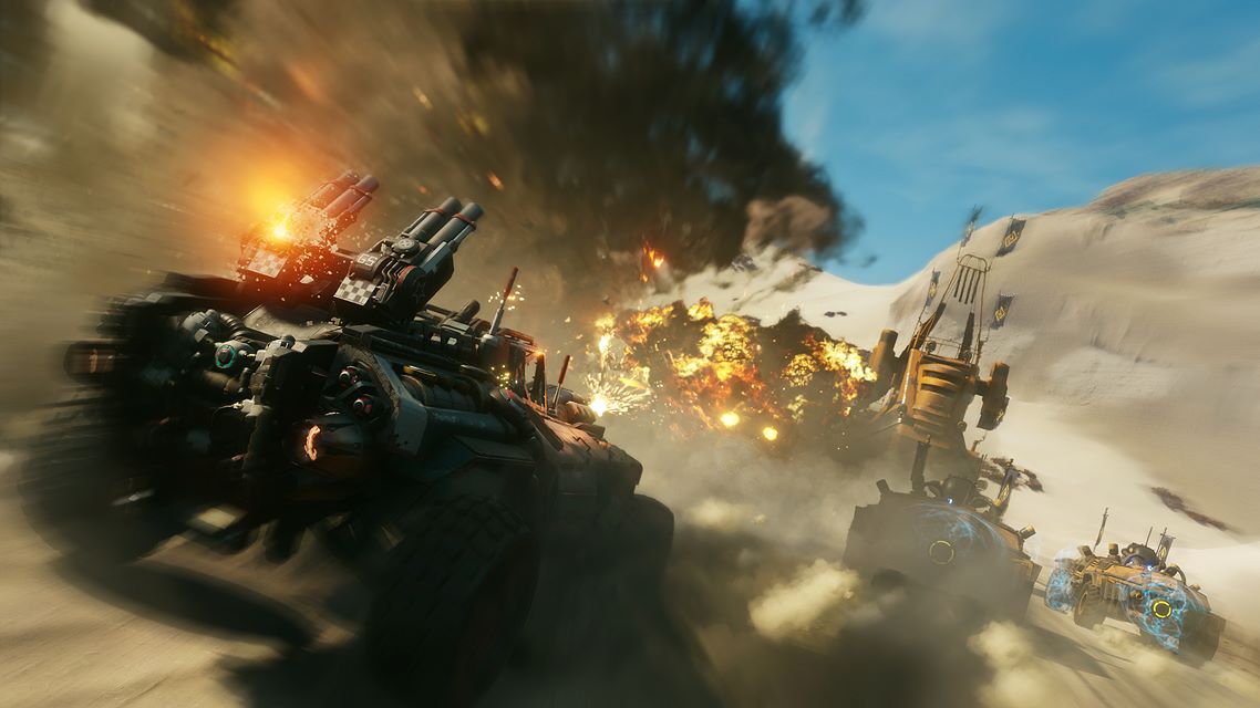 action shot of a weaponized vehicle approaching an exploding factory