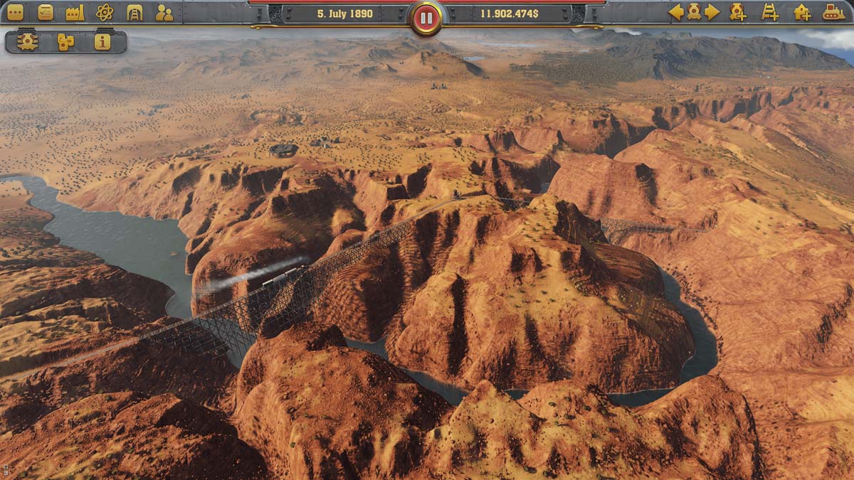 Overhead Shot of a Train Passing Through A Canyon