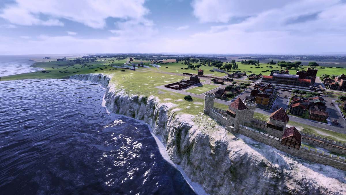 City at the Edge of the Coastline with a Train Passing by