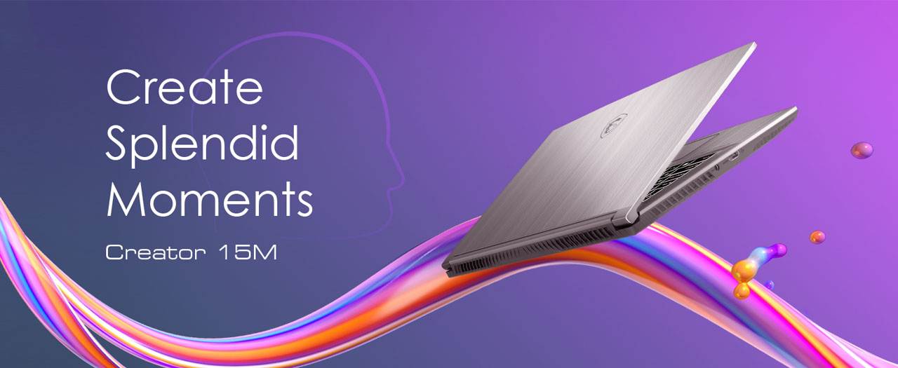 A laptop is above a colorful fluid